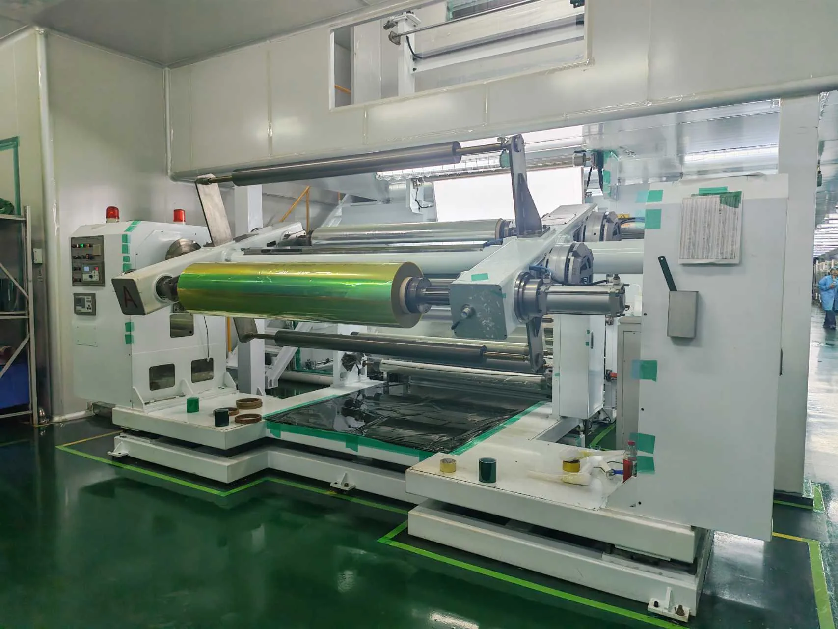 Film roll handling equipment in operation